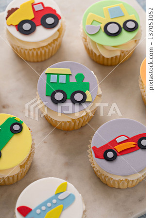 Cupcakes for a boy birthday or a baby shower with trucks and transport theme 137051052