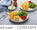 Egg bites with bacon and cheddar cheese, healthy breakfast meal prep idea 137051074