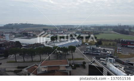 Aerial view of the industrial and residential area of Bedizzole, Brescia, Italy. Aerial view of the industrial and residential area of Bedizzole, Brescia, Italy. 137051536