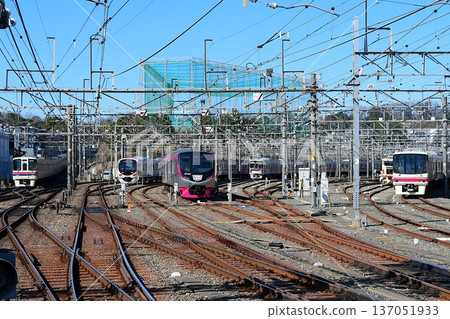 All Keio Line models lined up: 9000 series, 2000 series, 5000 series, 7000 series, and 8000 series 137051933