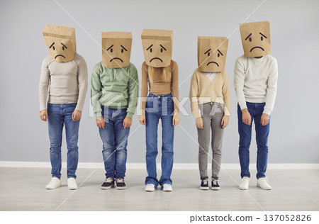 Diverse Group with Sad Faced Paper Bag Masks 137052826