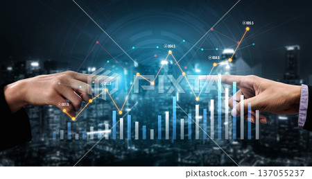 Hands Reaching Towards Financial Graph Representing Growth and Data Analysis Over Urban Cityscape at Night with Digital Elements Scalp 137055237