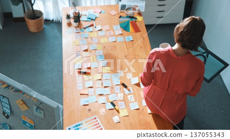 Top view of business woman hold tablet with logo design at meeting. Symposium. 137055343