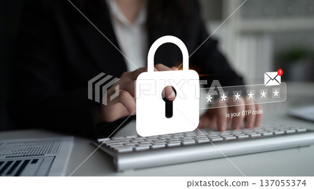 Secure Online Authentication with OTP Code Entry on Laptop in Modern Office Setting Featuring Password Protection Symbol and Email Notification Gantry 137055374