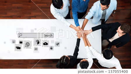 Collaborative Teamwork in Business Environment Highlighting Search Concepts and Connectivity Through Hands Joined in Unity on Modern Workspace Trope 137055400