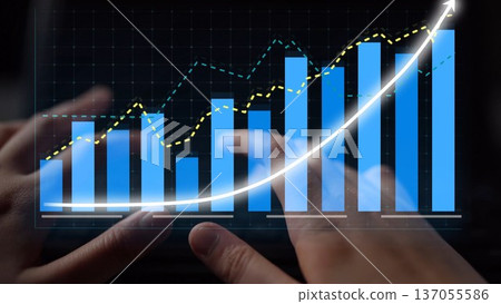 Hands Interacting with Data Visualizations on Screen Showing Financial Growth Trends and Bar Charts Against Dark Background Copula 137055586