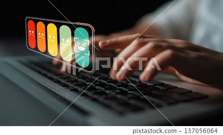 User typing on laptop keyboard with digital feedback icons showcasing emotions and reactions in a modern workspace environment Gluon User typing on laptop keyboard with digital feedback icons showcasing emotions and reactions in a modern workspace environment Gluon 137056064