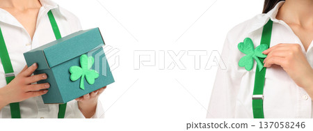 Two people hold a green box and wear a shamrock, PNG 137058246