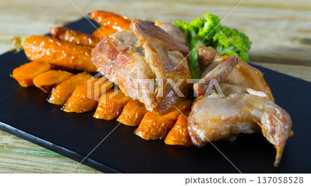 Quail teriyaki with grilled carrots and broccoli Quail teriyaki with grilled carrots and broccoli 137058528