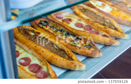 Traditional Turkish baked pide dish. Middle Eastern snacks 137059126