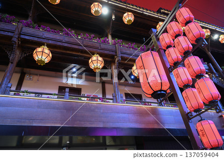 Night view of building with traditional red Chinese lanterns in Sanya Park on Hainan Island in China 137059404