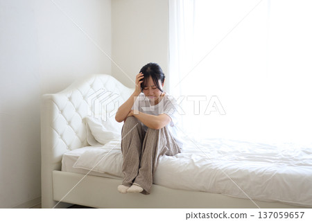 Woman feeling unwell 137059657
