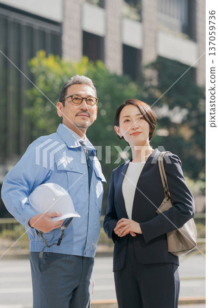 Image of men and women working in the construction industry Image of men and women working in the construction industry 137059736