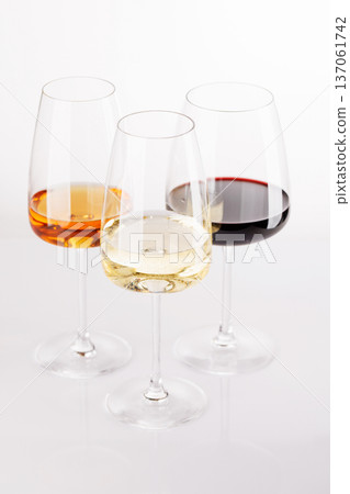 Different wine glasses on white background Different wine glasses on white background 137061742