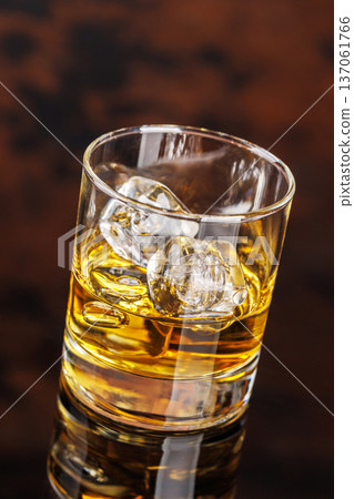 Glass of whiskey with ice Glass of whiskey with ice 137061766