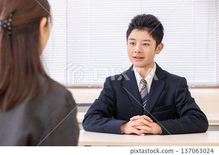 Male student having an interview Male student having an interview 137063024