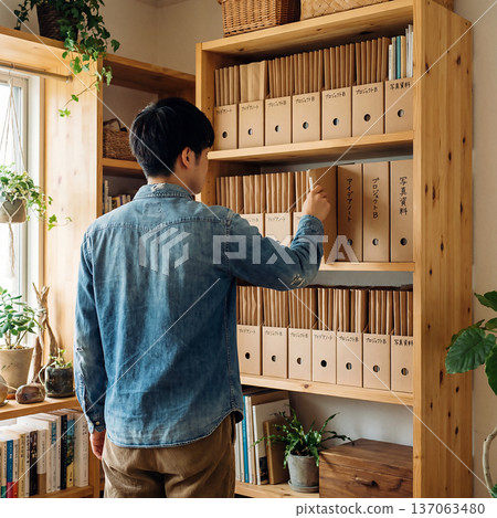 A rustic room with craft files lined up on wooden shelves 137063480