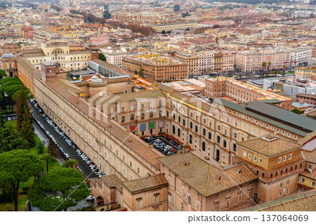 View of Vatican City and Rome from a high spot showing buildings and streets below View of Vatican City and Rome from a high spot showing buildings and streets below 137064069