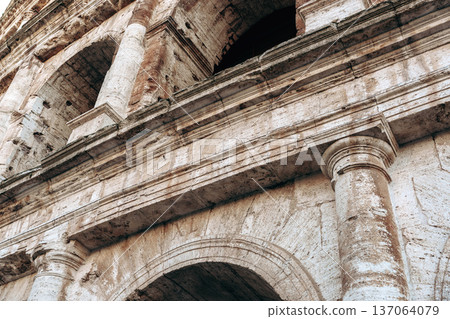 View of ancient structure from low angle with focus on stone details in daylight View of ancient structure from low angle with focus on stone details in daylight 137064079