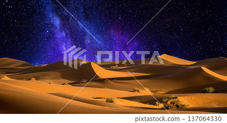 night landscape with desert dunes, starry sky and milky way in desert, abstract background. 137064330
