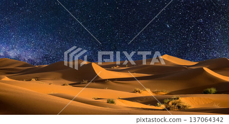 night landscape with desert dunes, starry sky and milky way in desert, abstract background. 137064342