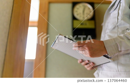 Workers check the documents 137064460