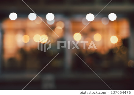 Soft focused image of cafe or restaurant interior with golden bokeh lights at night Soft focused image of cafe or restaurant interior with golden bokeh lights at night 137064476