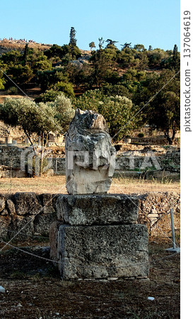 Ancient Stone Statue Monument at Roman Agora Athens Greece Ancient Stone Statue Monument at Roman Agora Athens Greece 137064619