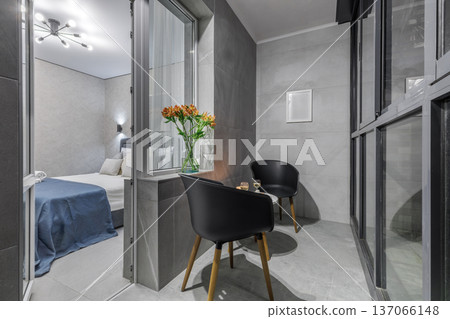 Modern Loggia Interior with Seating Area and Bedroom View Modern Loggia Interior with Seating Area and Bedroom View 137066148