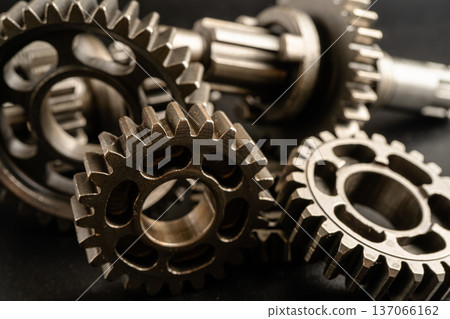 Gear and cogs wheels, clock mechanism, brass metal engine industrial. 137066162