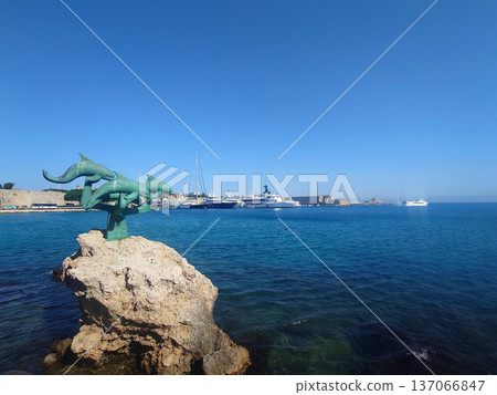 Dolphin Sculpture At Rhodes Harbor Greece 137066847