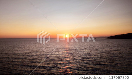 Aegean Sea Sunset Over Calm Ocean Horizon Aegean Sea Sunset Over Calm Ocean Horizon 137067890
