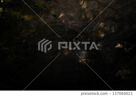 Image of rock face lit by sunlight at Chinpu Pass and Mezurashi Pass in Matsusaka City, Mie Prefecture Image of rock face lit by sunlight at Chinpu Pass and Mezurashi Pass in Matsusaka City, Mie Prefecture 137068021