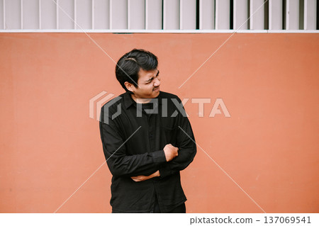Young man suffering from severe stomach ache or nausea 137069541