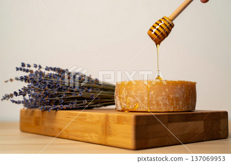 closeup of a wooden spoon with fresh flowers closeup of a wooden spoon with fresh flowers 137069953