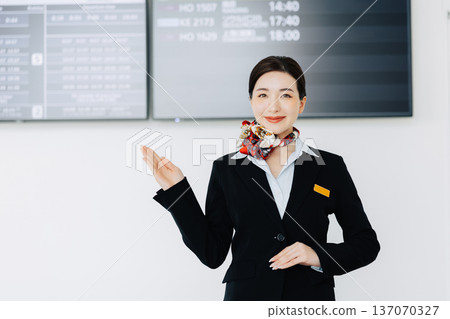 Female airport ground staff providing guidance (Photo courtesy of Kobe Airport (UKB)) 137070327