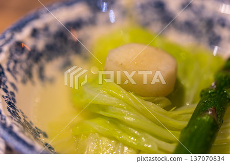 Delicate and refreshing vegetable broth appetizer 137070834