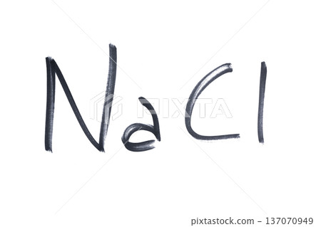 the symbol for sodium chloride written with a black marker 137070949