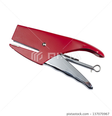 a red stapler a red stapler 137070967