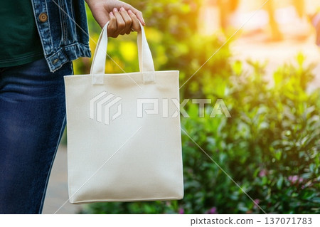 Photorealistic Image of Unbranded White Tote Bag in Outdoor Setting Photorealistic Image of Unbranded White Tote Bag in Outdoor Setting 137071783