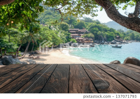 Rustic Wooden Table in Foreground with Tropical Landscape in Background 137071793