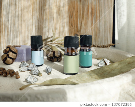 Aromatic perfumed oil for calm and mental health. Aromatherapy with natural herbs. Template, background for design, mockup. Composition with natural objects. Aromatic perfumed oil for calm and mental health. Aromatherapy with natural herbs. Template, background for design, mockup. Composition with natural objects. 137072395