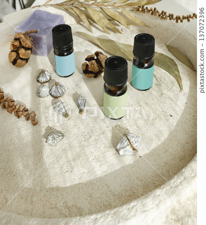 Aromatic perfumed oil for calm and mental health. Aromatherapy with natural herbs. Template, background for design, mockup. Composition with natural objects. Aromatic perfumed oil for calm and mental health. Aromatherapy with natural herbs. Template, background for design, mockup. Composition with natural objects. 137072396