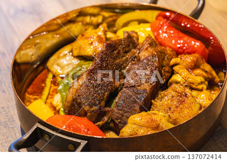 Mediterranean flavor: Copper pot glazed roasted beef ribs Mediterranean flavor: Copper pot glazed roasted beef ribs 137072414