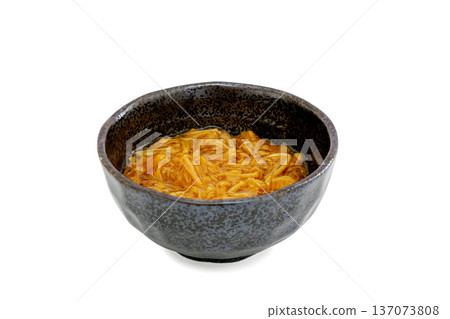 Nametake mushrooms served in a small bowl, a side dish for rice [white background, cutout] 137073808