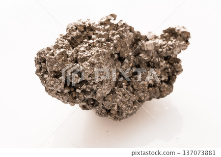 Close-up of metallic pyrite crystal cluster showcasing intricate cubic formations and golden-bronze luster on white background 137073881