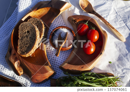 colorful rustic style lunch background with wooden plates and food 137074061