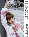 little cute blond girl curious smiling playing outside on sea, lifestyle people concept 137074342