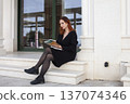 young red head woman walking on Europe city, lifestyle people concept 137074346