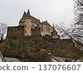 old castle surrounded by mountains 137076607